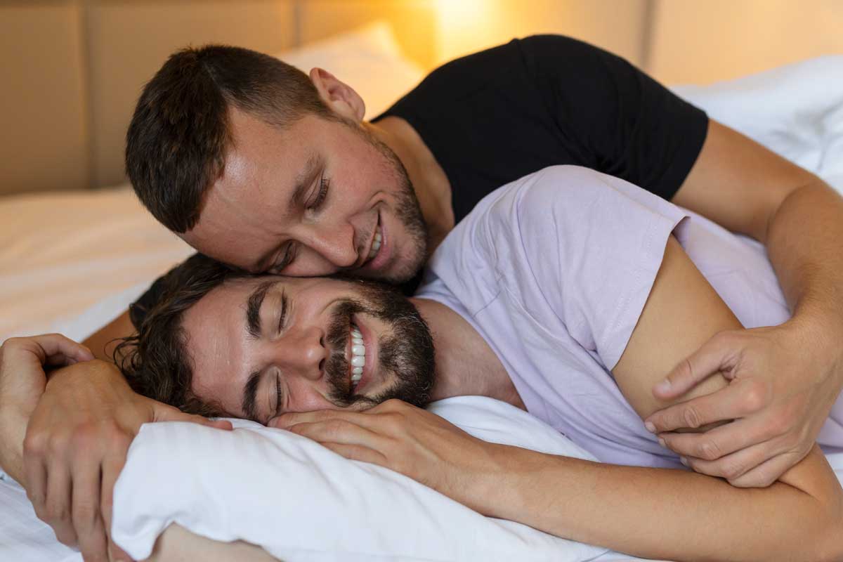 gay couple in bed